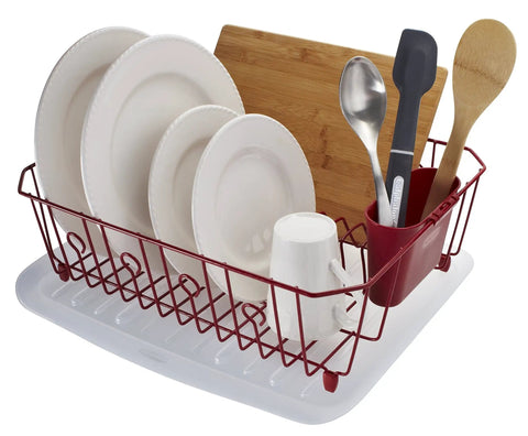 Clear Plastic Dish Drainer For Countertop With Over Sink Lip Sloped Drainer Board filled with dishes and utensils