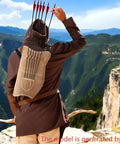 Man wearing waxed canvas archery quiver with slots and adjustable shoulder strap, outdoor hiking hunting and target practice