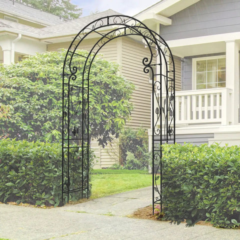 Sturdy Rust-Resistant Metal Garden Arch With Trellis For Climbing Plants 88 Inches High By 51 Inches Wide in a garden setting.