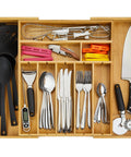 Extra Deep Silverware Drawer Organizer With Adjustable Dividers Expands From 14 To 21.6 Inches Bamboo Flatware Tray For Kitchen Beefy Wood Cutlery Holder Fits Wide Drawers, showing organized utensils.