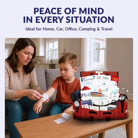 Red emergency first aid trauma kit opened on a table with medical supplies; woman bandaging a child's arm.