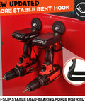 Upgraded Large Magnetic Hooks With 20lb Capacity holding power drills on red surface, side view