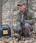 Hunter using 12,000 BTU Portable Propane Radiant Heater For Camping And Hunting Heats Up To 300 Sq Ft Camouflage Finish in forest