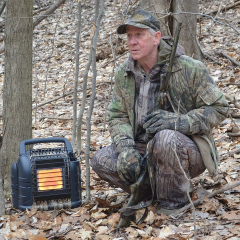 Hunter using 12,000 BTU Portable Propane Radiant Heater For Camping And Hunting Heats Up To 300 Sq Ft Camouflage Finish in forest