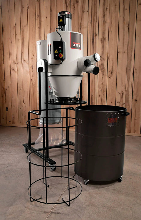Professional 3 Hp 230 Volt Cyclone Dust Collector With 2 Micron Pleated Filter and Wireless Remote Timer Shut Off beside a black drum.