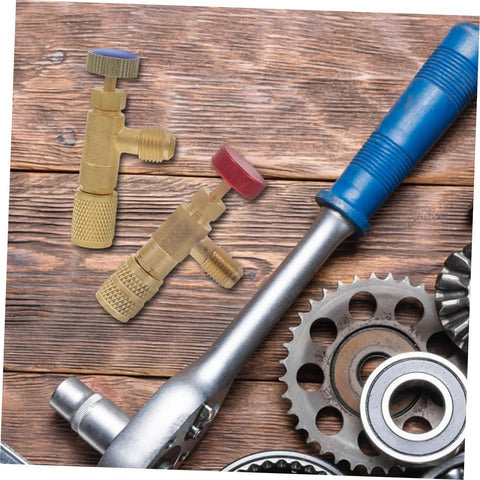 Heavy Duty Brass Refrigerant Valve Adapter Swaps R410 To R22 Smooth As Silk For Car Ac And Ev Coolers No Sweat Plug Right In Quick Install Fitting Kit With Injector with red and blue knobs on wooden background.