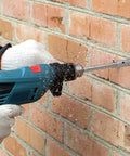 Heavy Duty Hole Saw Kit With Carbide Tips For Drilling Concrete Stone And Masonry Bricks Featuring Long Lasting Tool Steel Build Perfect For Electrical Installations And Home Improvement Projects That Need Reliable Performance. Drilling brick wall