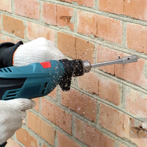 Heavy Duty Hole Saw Kit With Carbide Tips For Drilling Concrete Stone And Masonry Bricks Featuring Long Lasting Tool Steel Build Perfect For Electrical Installations And Home Improvement Projects That Need Reliable Performance. Drilling brick wall
