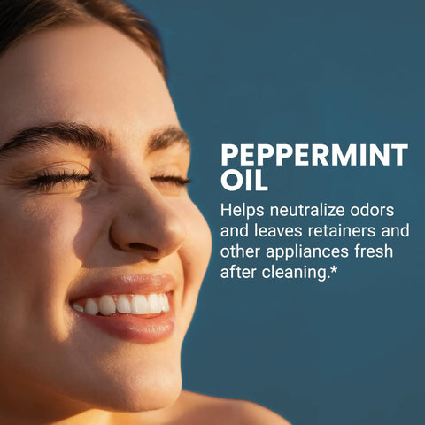 Smiling person with text about peppermint oil benefits for Extra Strength Retainer And Denture Cleaning Tablets 8 Month Supply Removes Odor.