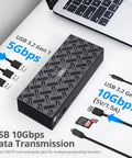 Total Game Changer DisplayLink USB C Dock For Laptop Battlestation Quad 4K 60Hz Monitor Support with USB 3.2 ports shown.