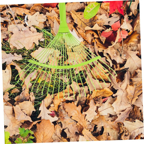 Dope Garden Rake Hand Tool With Tough Tines For Loosening Soil And Cultivating Flowers And Plants Lightweight Gardening Supply For Lawn Maintenance Ideal For Weeding Dethatching And Easy Garden Care green steel rake over leaves