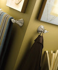 Preston Collection Brushed Nickel 18 Inch Bathroom Towel Bar installed with a coordinating hook for bathroom use