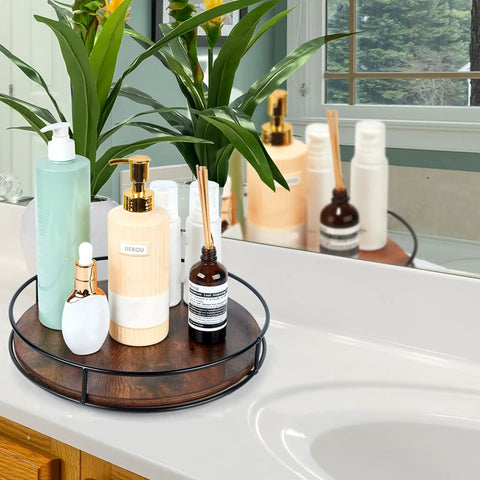 12 Inch Lazy Susan Slick Counter Turntable Kitchen Spice Rack Rustic Brown Wood Swivel Tray holding skincare products on vanity.