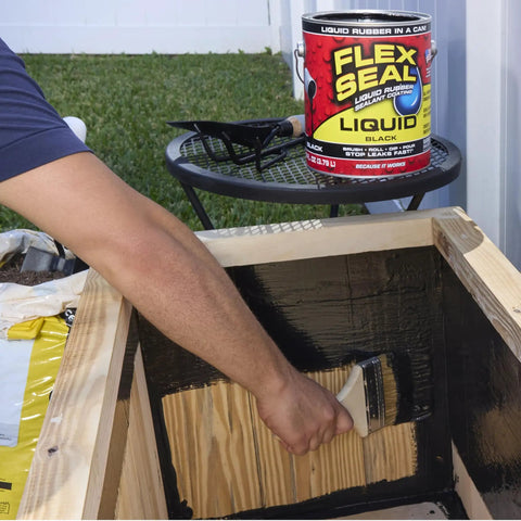 Applying Liquid Rubber Sealant Coating for Waterproof, Flexible Protection on Wood Surface using Brush, 1 Gallon Can in View