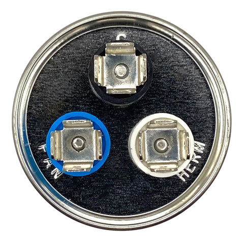 Top view of Dual Run HVAC Capacitor 45 Plus 5 MFD 370 440V Kit terminals marked FAN, C, and HERM for condenser and fan replacement.