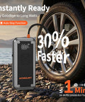 W160 Jump Starter With Air Compressor inflating car tire next to a vehicle on a rocky landscape