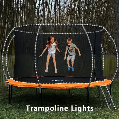 Trampoline with Solar Rope Lights Outdoor Waterproof 2 Pack 33ft 100 LED String Lights With 8 Modes in a garden setting
