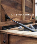 Close-up of Acacia Wood Patio Cooler with air shock hinges, 100 Qt capacity ice chest with easy open lid and TPE insulated liner.