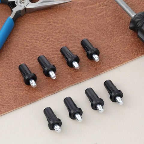 Heavy Duty Cabinet Door Repair Pins 8 Piece Kit Spring Loaded Hinge Dampers on a brown surface, showcasing black snap-in furniture hardware.