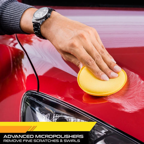 Person using Scratch Out Liquid Car Scratch Remover And Polishing Compound For Light Scratches, Hazy Paint And Swirl Marks, Restore Showroom Shine Fast In One Easy Step, 7 Oz Bottle on red car