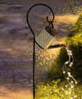 Solar Garden LED Light Watering Can Fairy Lights For Pathway Yard Lawn Patio Decor Outdoor Stake Light Sun Powered No Cord Needed Whimsical Garden Vibe With Romantic Twinkle And Easy Install, showing a bronze watering can with string lights.