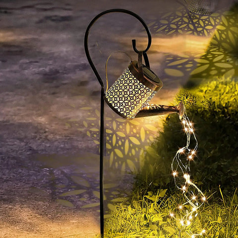 Solar Garden LED Light Watering Can Fairy Lights For Pathway Yard Lawn Patio Decor Outdoor Stake Light Sun Powered No Cord Needed Whimsical Garden Vibe With Romantic Twinkle And Easy Install, showing a bronze watering can with string lights.