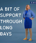 Woman wearing beige Relief Thigh High Graduated Compression Stockings For Daily Wear, 15 To 20 MmHg, Unisex Comfort Fit with skirt.
