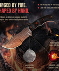 Beefy 10 Inch Damascus Steel Tracker Knife With Full Tang Fixed Blade Micarta Handle shown forged by hand on burning log