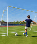 Youth playing soccer with a 12x6 Ft Foldable Steel Backyard Soccer Goal With Weatherproof Net Perfect For Teens And Adults Practice Drills
