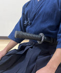 Polypropylene Short Practice Samurai Training Sword 24-Inch With Black Saya Scabbard worn by martial artist
