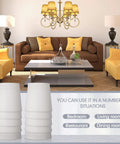 Pack Of 10 White Linen Barrel Lamp Shades For Chandeliers And Table Lamps 4 Inch Top Diameter 5 Inch Bottom Diameter 5 Inch Height displayed in a living room setting with chandelier.