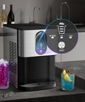 Countertop Nugget Ice Maker With 44 Lbs Per Day Output, Self Cleaning, One Touch Operation, 2.4L Water Tank, Fast Freeze Pebble Ice, Compact Pellet Ice Machine For Home And Kitchen, Silver on a kitchen counter with two drinks