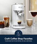 Compact Espresso And Cold Brew Coffee Maker Featuring Built In Milk Frother Wand For Next Level Iced Lattes Smooth Hot Drinks And Straight Up Barista Quality Blends Daily on a countertop with various drinks.