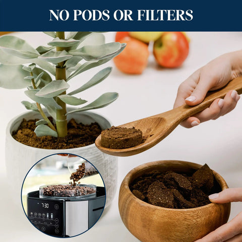 True Brew Drip Coffee Maker With Built In Grinder And Single Serve Function Brew 8 Oz To 24 Oz Hot Or Iced Coffee Stainless Steel CAM51025MB shown with coffee grounds and plant