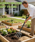 Man using Rugged 46 Inch Garden Pitch Fork With Four Tines Heavy Duty Steel Ergonomic D Handle Anti Rust Coating Ideal For Digging Soil Turning Compost Loosening Dirt And Moving Hay Or Mulch in raised garden bed