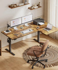 Brown 55x28 Inch Reversible L Shaped Electric Standing Desk With Height Adjustable Sit Stand Motorized Base Ergonomic Computer Corner Table For Home Office Workstation featuring dual monitors and printer.