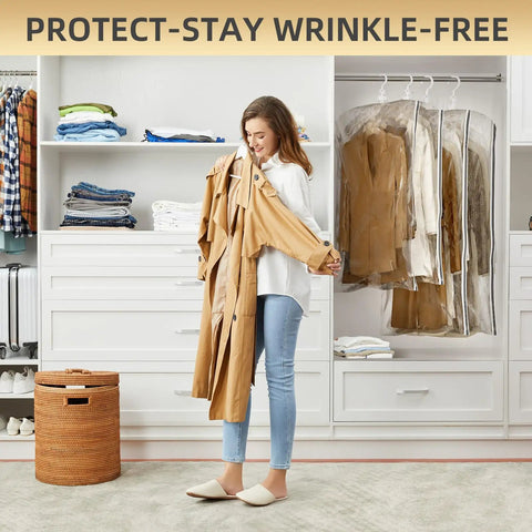 Woman organizing clothes with Hanging Vacuum Storage Bags Space Saver For Clothing Suits And Jackets, Closet Organizer Travel Set Of 4 With Two Long And Two Short Bags Clear, Reducing Bulk And Keeping Garments Fresh.