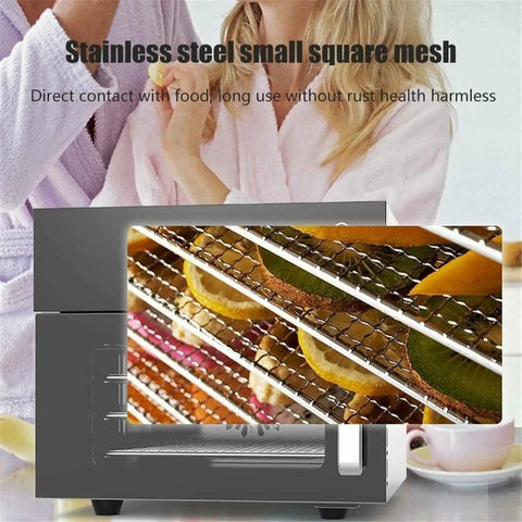 Durable 4 Layer Stainless Steel Electric Food Dehydrator With Smart Temp Gauge showing drying fruits on stainless mesh racks.