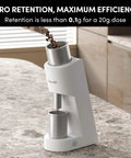 Top Tier Single Dose Coffee Grinder Built For Killer Extraction Features Super Tight Stepless Adjustment And Complete Zero Retention on a kitchen countertop.