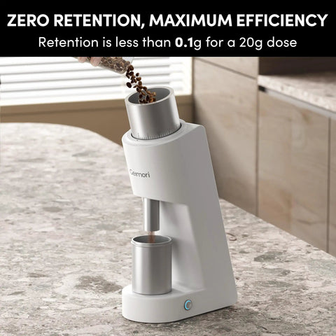 Top Tier Single Dose Coffee Grinder Built For Killer Extraction Features Super Tight Stepless Adjustment And Complete Zero Retention on a kitchen countertop.