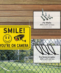 Two Pack Smile Youre On Camera Sign For Outdoor Video Surveillance Signs UV Printed Aluminum 10 By 7 Inches mounted on fence