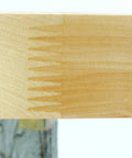 Close-up of maple wood grain showing joint detail for Premium Wood Lazy Susan Double Tier Turntable For Corner Base Cabinets With Smooth As Butter Chrome Hub Adjustable Telescoping Post Includes Required Mounting Hardware.