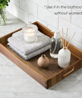 Solid Acacia Wood Serving Trays 2 Pack Real Deal Party Platters with towels, candle, and diffuser for bathroom use.