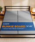 Heavy Duty Bunkie Board King Size 76X80 Real Deal Mattress Support That Cuts Down Saggin Fast Keeping Your Sleep Game Strong With A Breathable Wood Base Built Tough For Any Bedroom Setup on a bed frame in a modern bedroom.