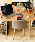 Straight Up Solid 28 Inch Rubber Wood Table Legs Built Tough As Nails For Dining Tables Home Desks And Kitchen Islands with a laptop and tablet on a wooden desk.