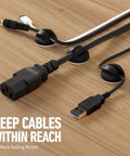 Under Desk Cable Management Kit With Tray, Spiral Wrap, Cable Band And Clips holding cables on wooden desk surface