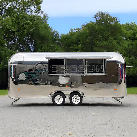Lightweight Mobile Food Trailer With Full Plumbing And Electrical Wiring Solid Rig For Your Downtown Block Party Or Street Food Hustle Ready To Roll Smooth Today, shiny silver exterior with serving window.