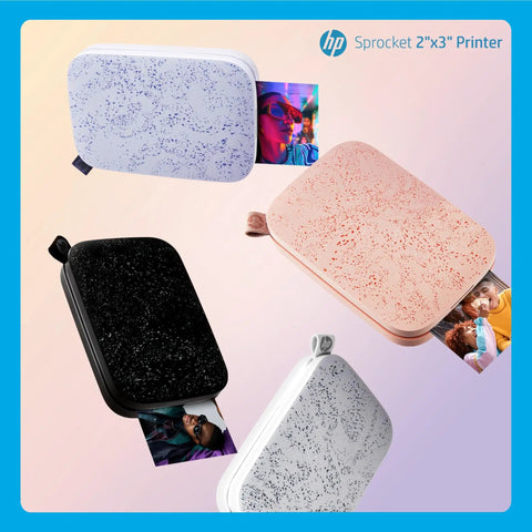 Pocket Sized Photo Printer For Instant Two By Three Inch Sticky Back Photos From Your Phone On The Go Luna Pearl Edition shown in multiple colors.