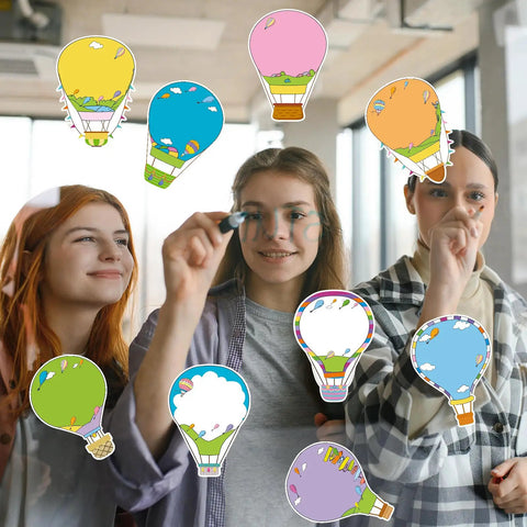 Hot Air Balloon Sticky Notes Bulk Pack, 36 Packs In 9 Styles, 2.9 X 3.9 Inch displayed by smiling students in classroom