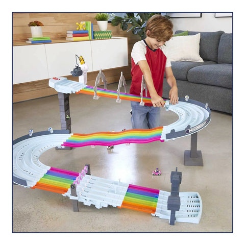 Child playing with Hot Wheels Mario Kart Rainbow Road Raceway Track Set With Lights And Sounds Eight Foot Long Rainbow Course